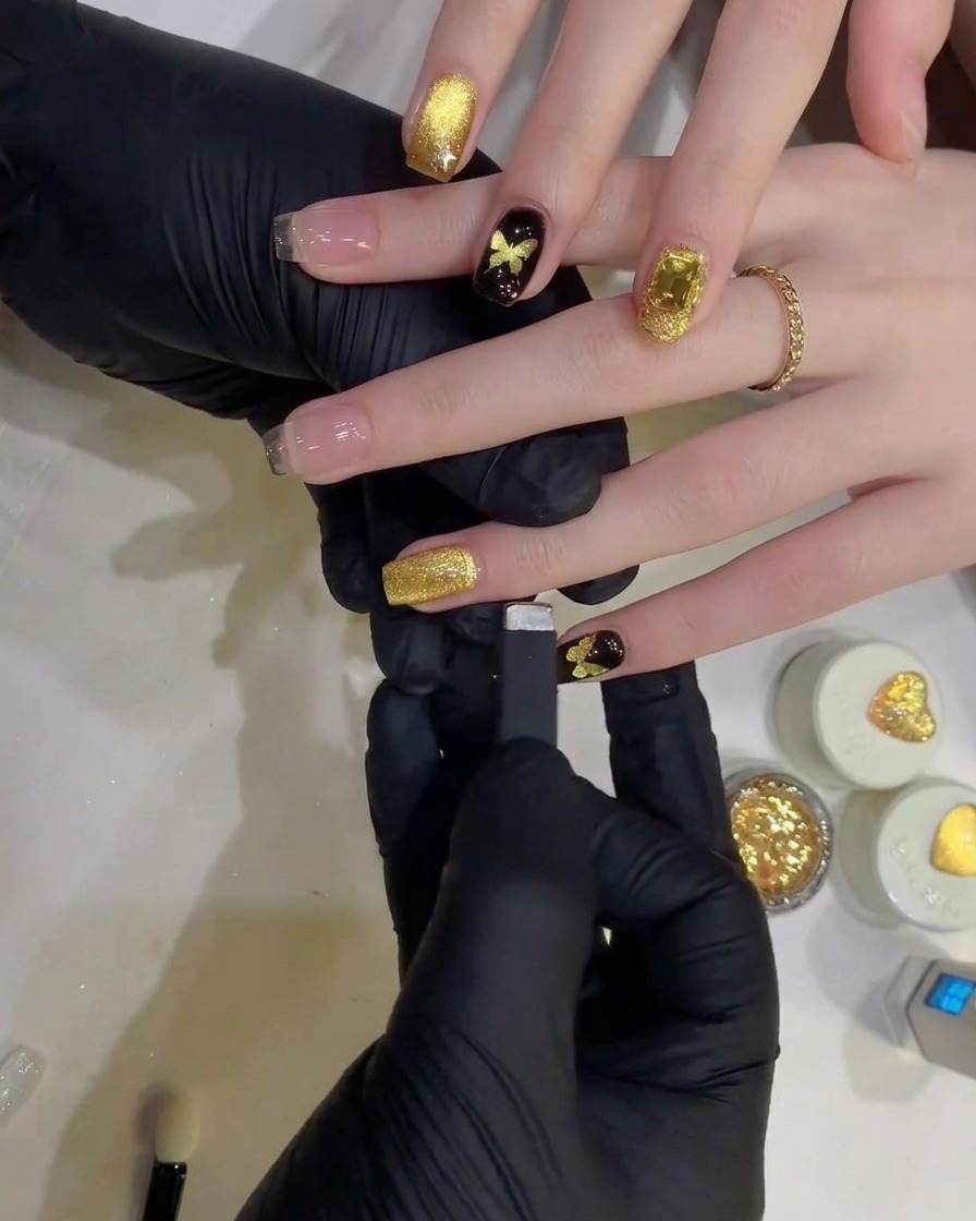 A wide magnetic tool positioned near the tip of a nail to manipulate the cat-eye shimmer.