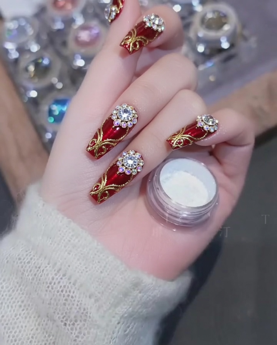 A close-up of a nail being painted with a sheer nude gel polish starting from the cuticle.