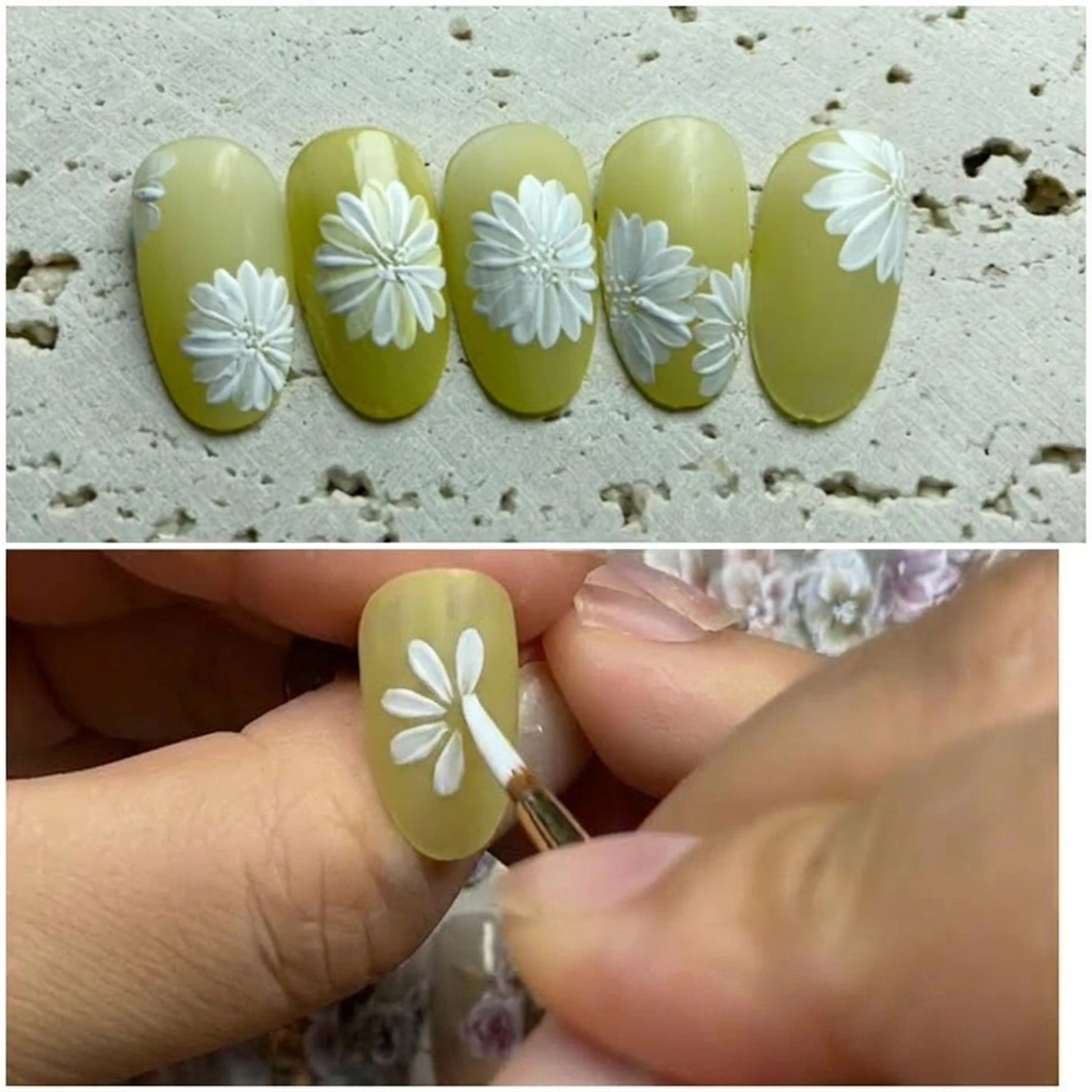 A second white petal being added to the daisy design.
