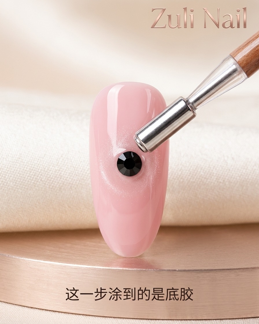 A close-up view of a clear gel bead sitting in the center of a fingernail, ready to be leveled.