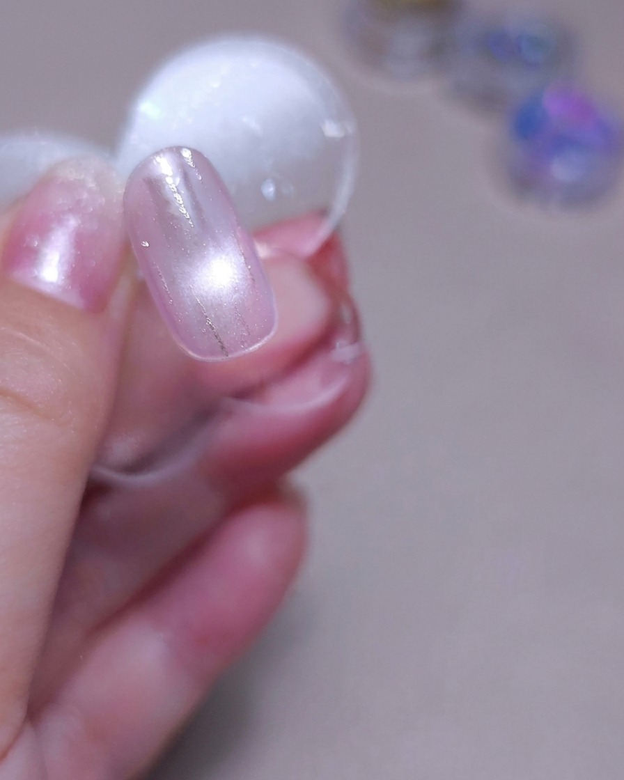 A nail being cured inside an LED nail lamp.