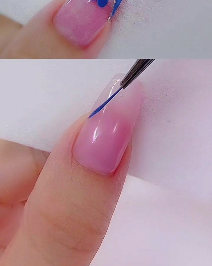 A flat gel brush filling the outlined French tip area with opaque blue gel polish.