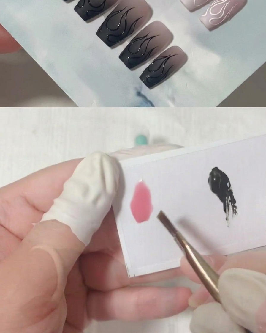 A brush applying a clear matte top coat over a gradient-colored nail.