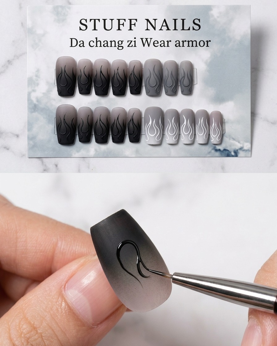 A fine liner brush defining the outer right edge of the black flame design on the nail.
