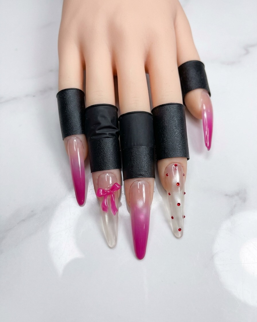 A nail art brush applying grey metallic gel polish to a single fingernail.