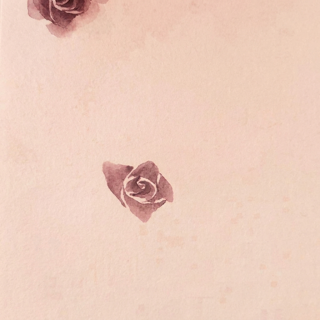 A watercolor rose on paper showing three distinct layers of petals forming the bloom.