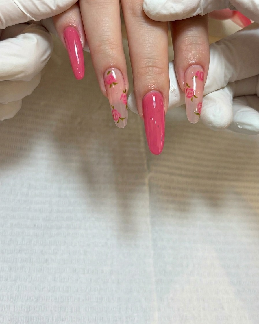 A close-up showing the creation of a second rose cluster on a different part of the nail bed.