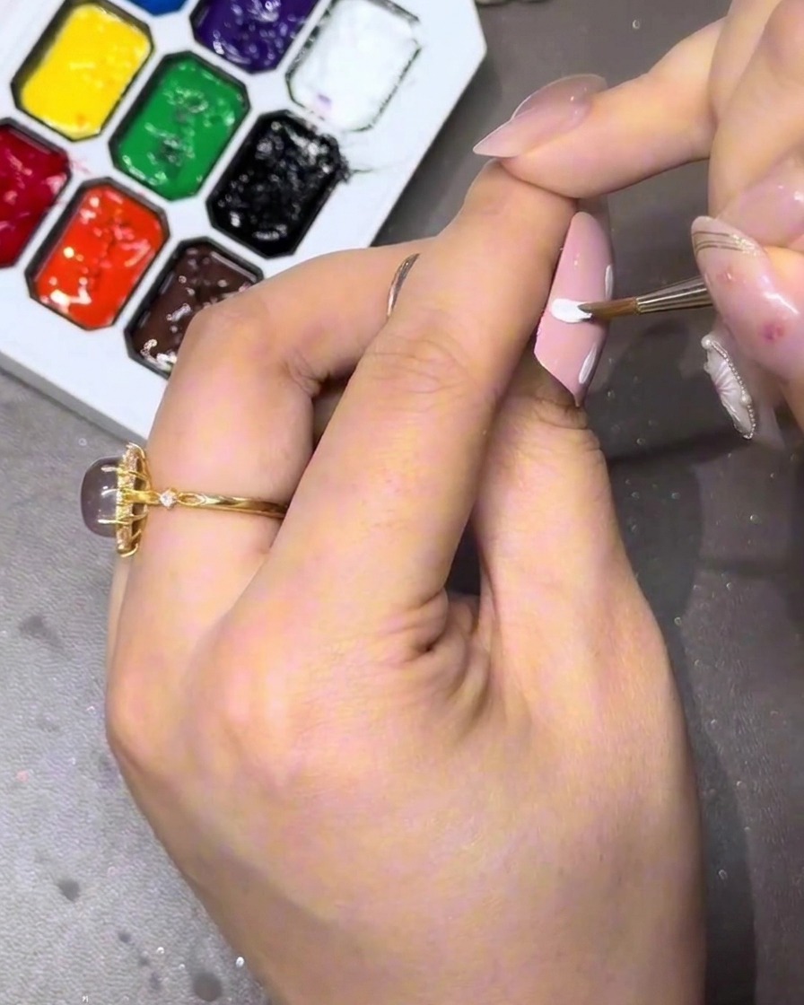 A close-up showing the four primary directional petals completed.