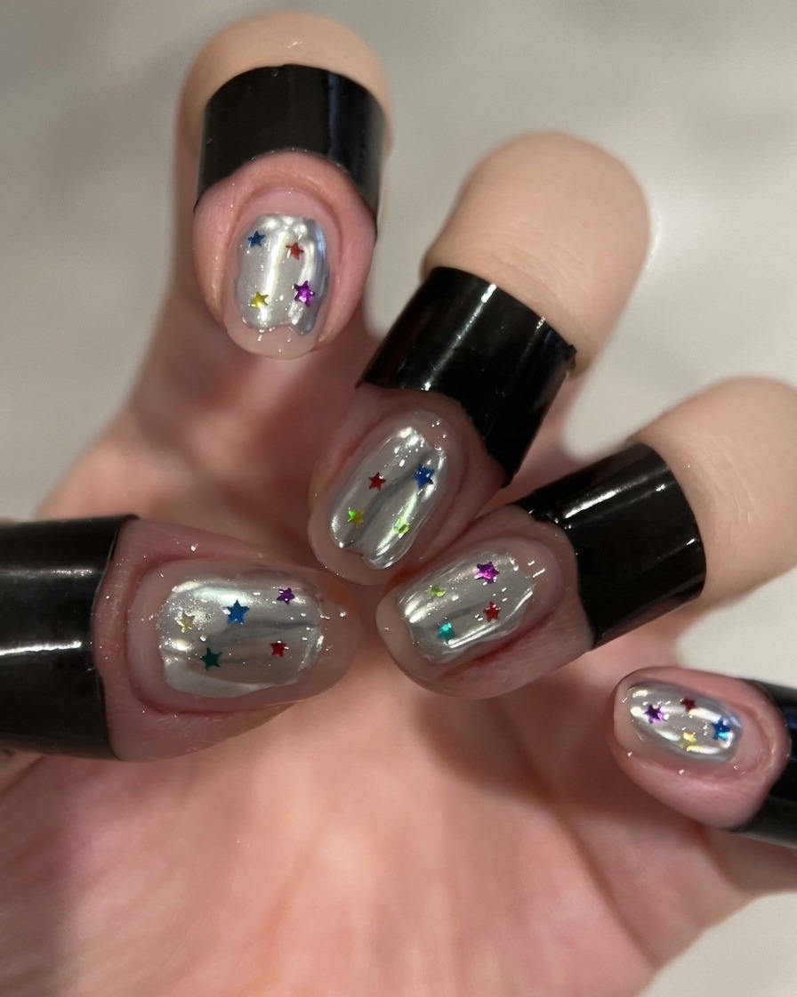 A nail art brush applying clear builder gel to a specific section of the nail.