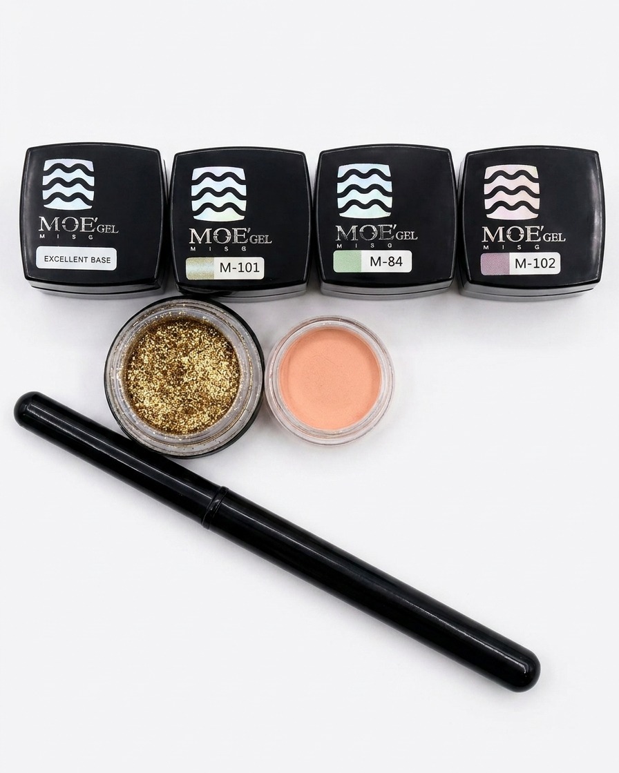A brush applying clear MOE base gel to a nail tip.