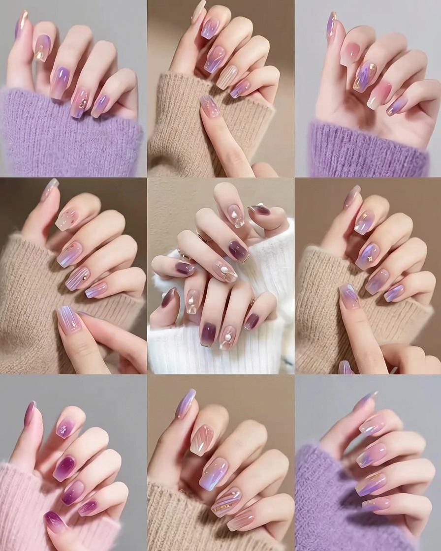 A close-up view of a brush applying a clear gel base coat onto a natural, prepped fingernail.