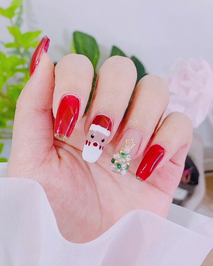 A manicure brush applying a smooth coat of dried rose-colored gel onto a fingernail.