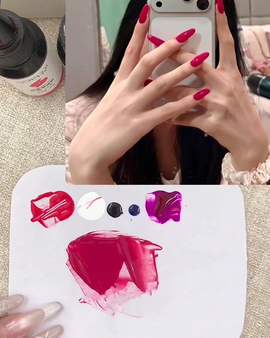 A small amount of vibrant red gel being folded into the existing mixture to perfect the berry red shade.