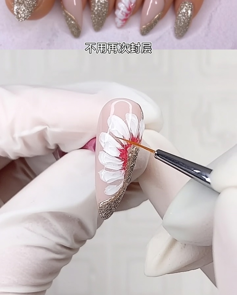 A close-up view of the finished 3D floral nail design being cured under a professional nail lamp.