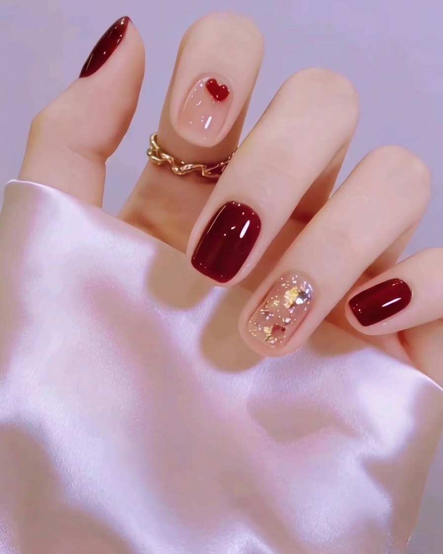 A hand resting inside a professional UV LED nail lamp while the base coat cures.