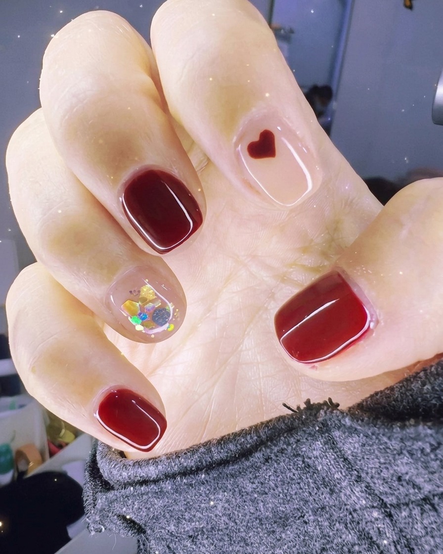 Nails being cured inside a professional UV/LED nail lamp.