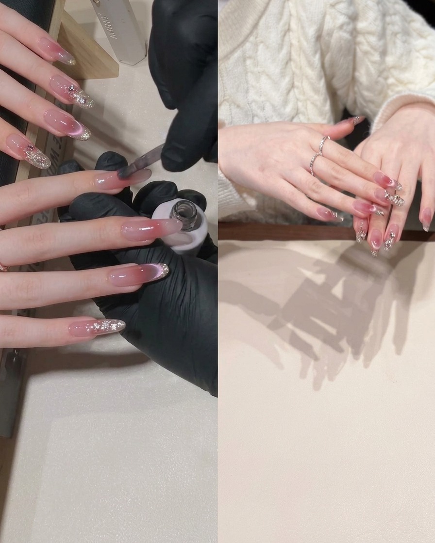 A brush applying pink cat-eye gel to the lower portion of a nail, leaving the upper part clear.