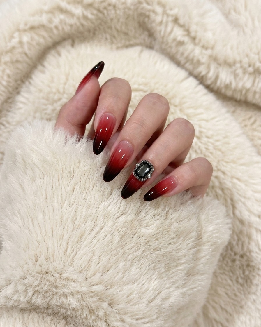 A hand using a cleansing wipe to remove the sticky layer from a cured gel-painted nail.