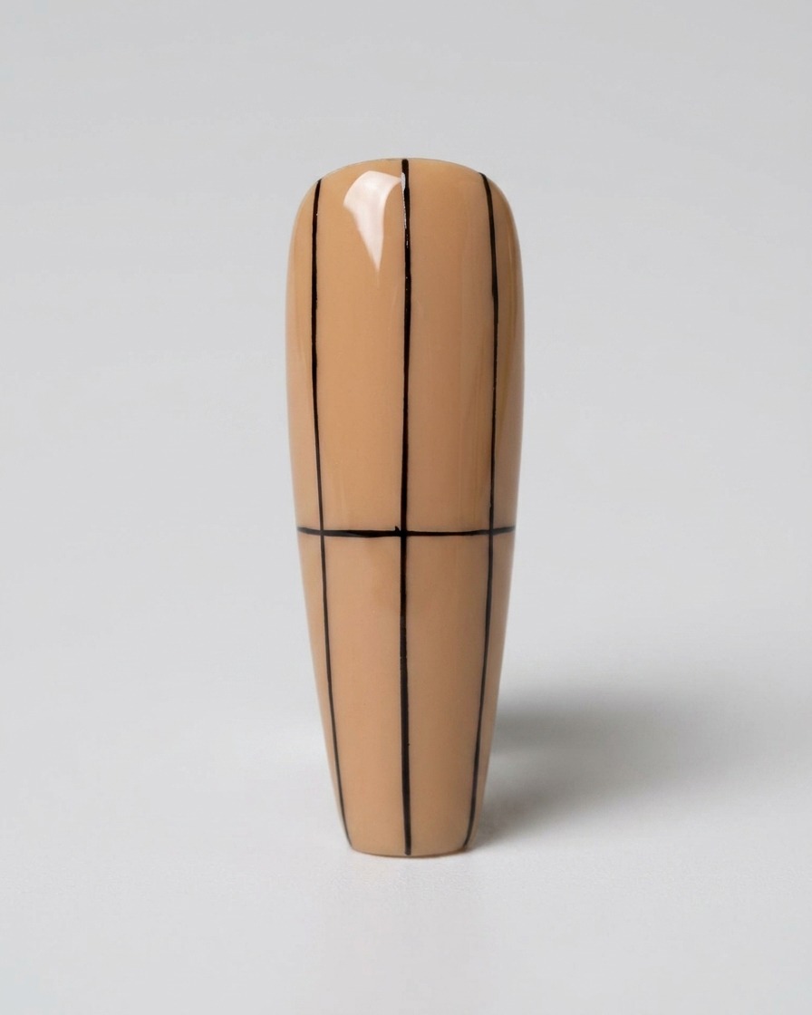 A nude-colored nail featuring a complete grid structure with vertical lines and a central horizontal line.
