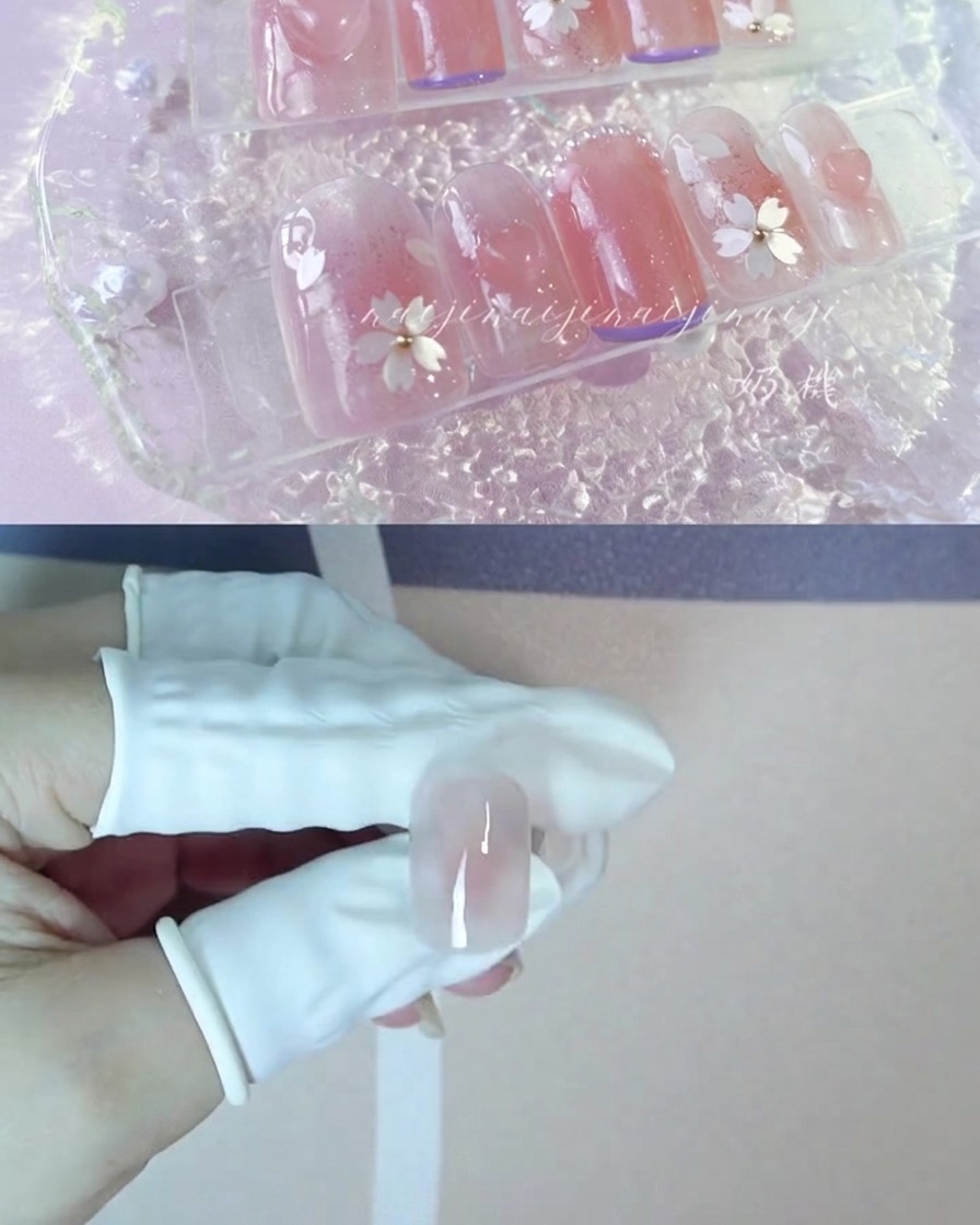A detailing brush refining the edges of a blended blush design on a nail.