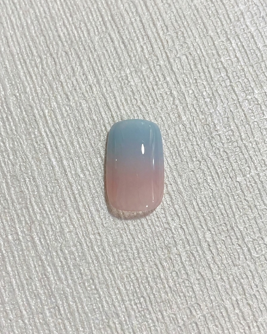 A magnetic wand held close to the nail surface to activate the cat eye shimmer.