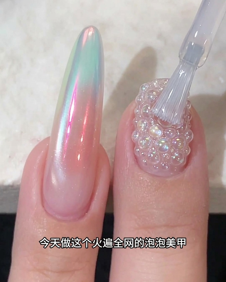 A sponge tool picking up shimmering aurora chrome powder.