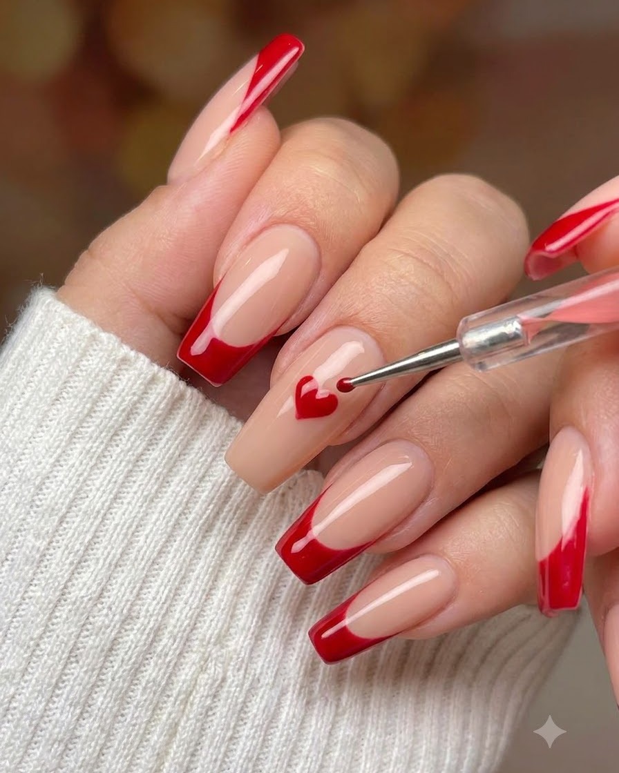 A fine nail art brush filling in alternating sections of a grid pattern with white polish.