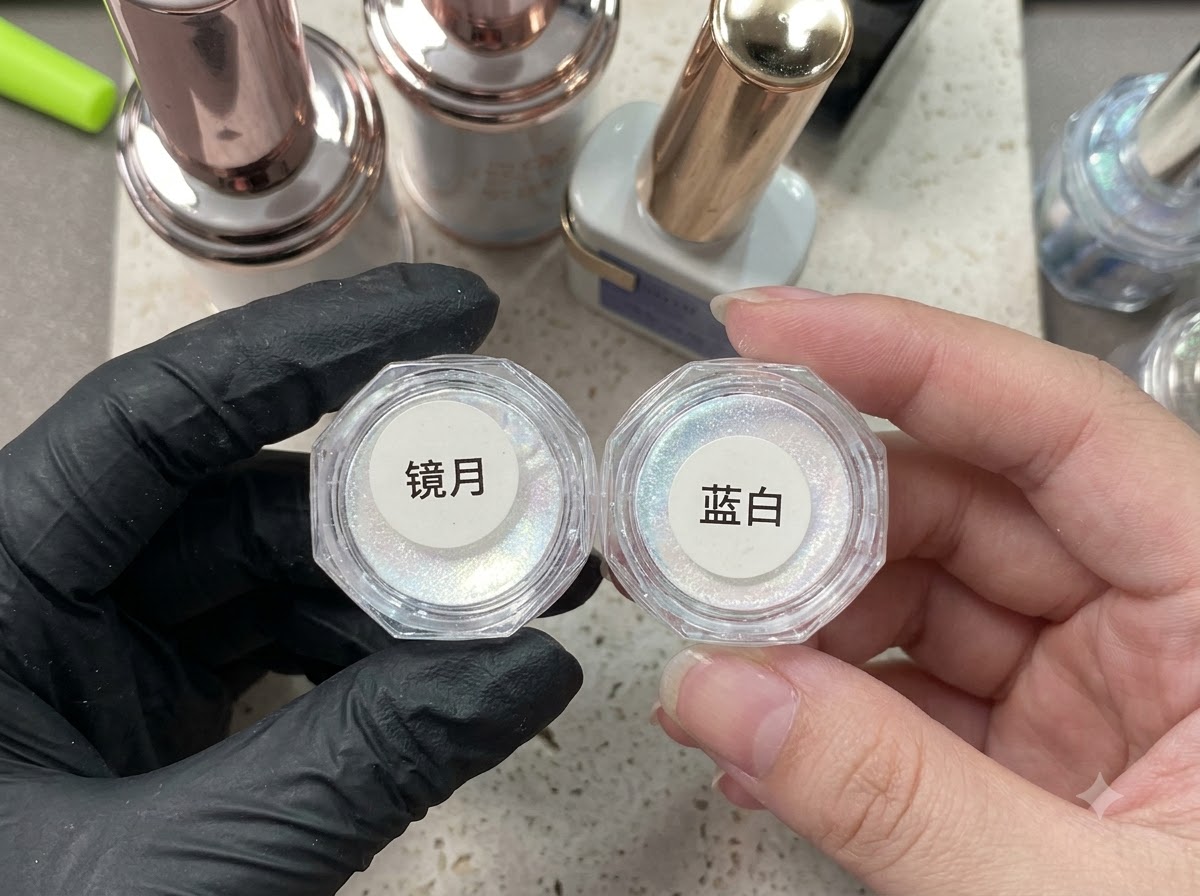 A person holding two open jars of iridescent aurora powder in gloved hands.