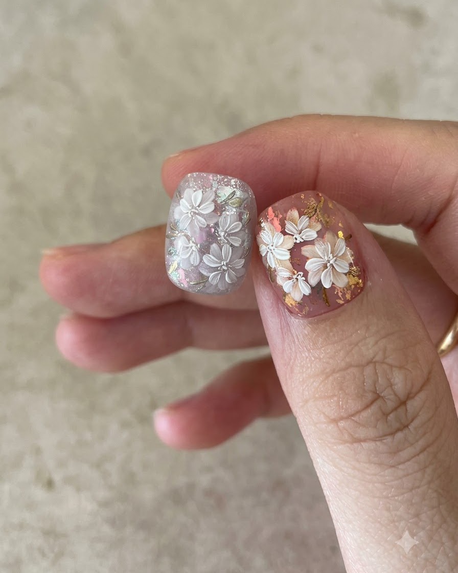 Applying a matte top coat over the embedded foil on the nail.