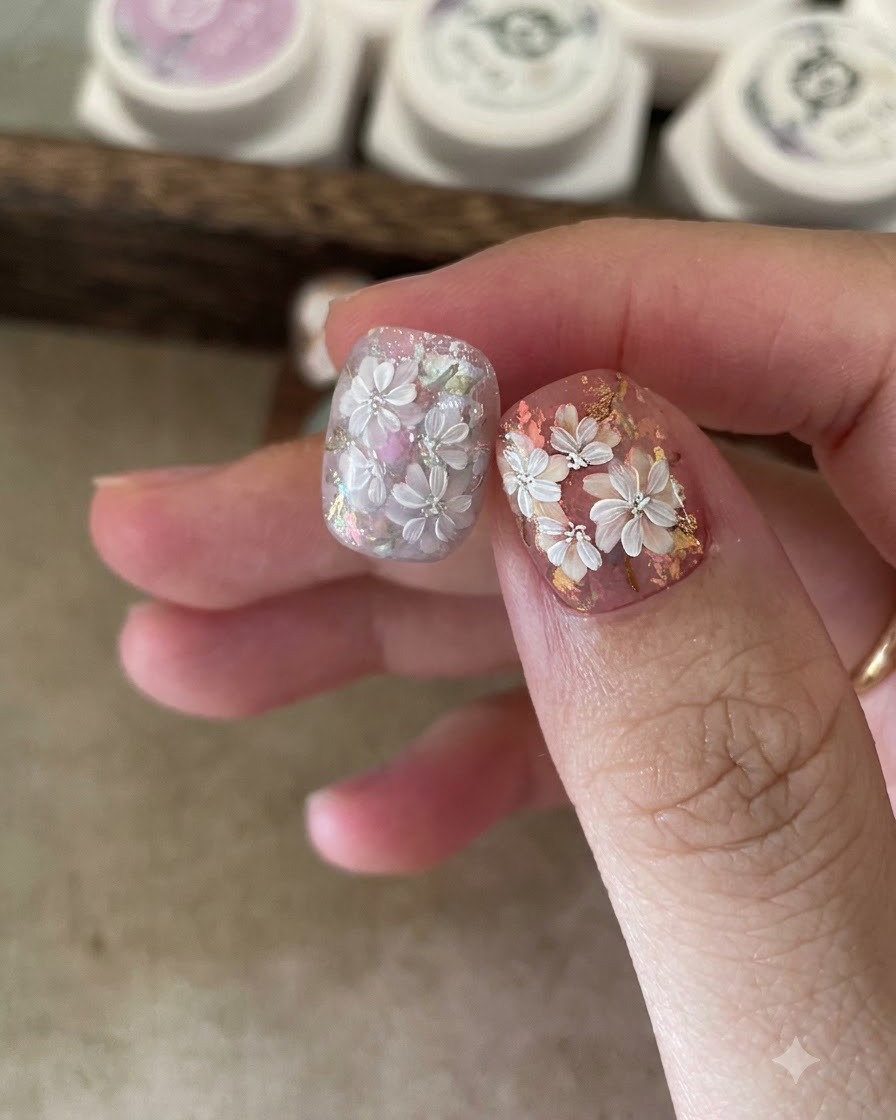 A brush blending purple gel dots to achieve a soft blooming watercolor effect.