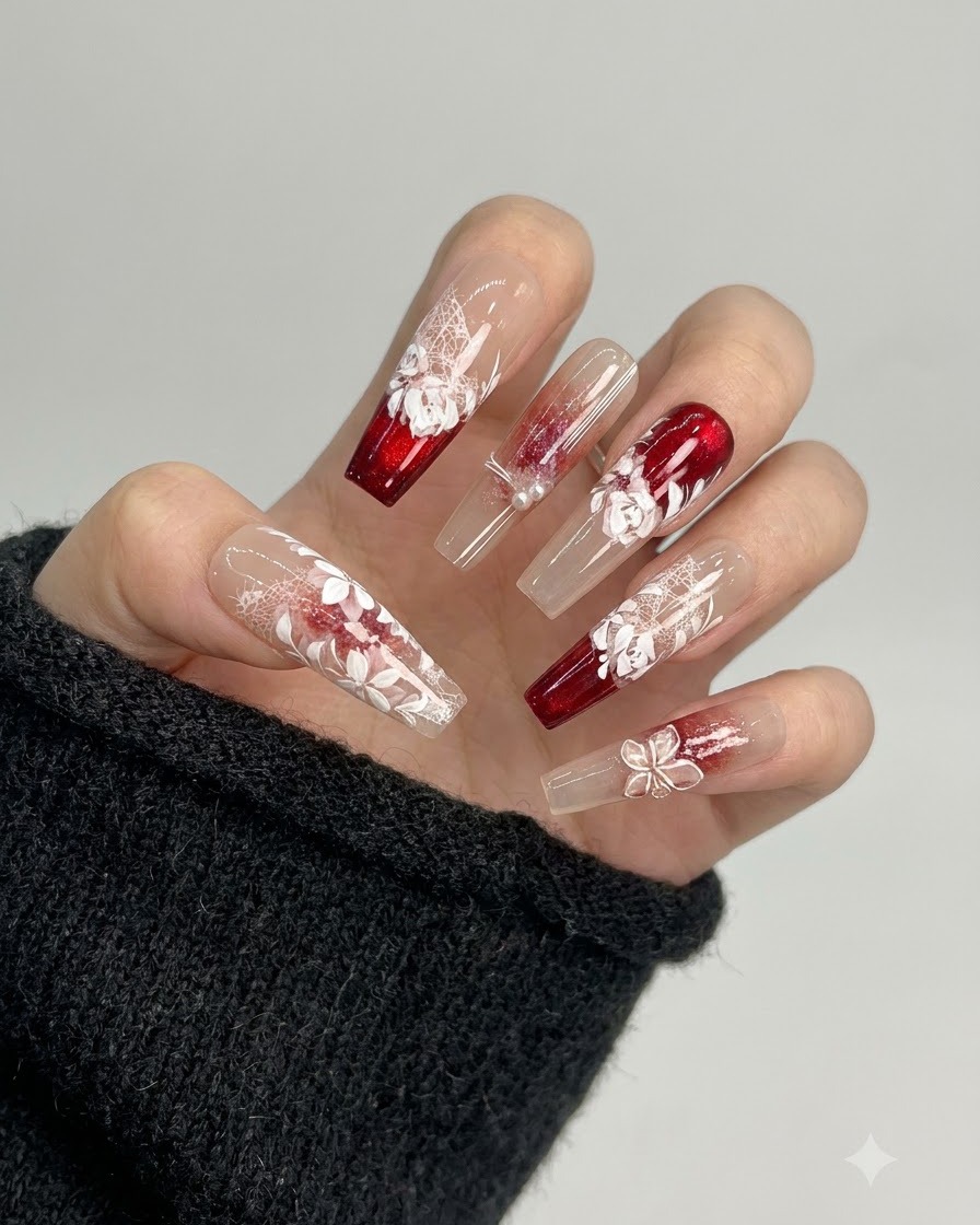 A full view of multiple finished and semi-finished press-on nails displayed on a hand.