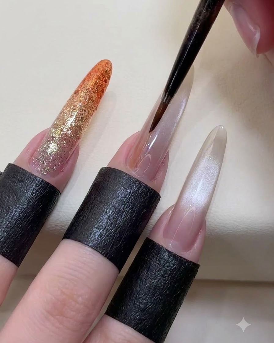 A fine liner brush drawing thin vertical and horizontal lines to form a grid pattern on a long almond nail.