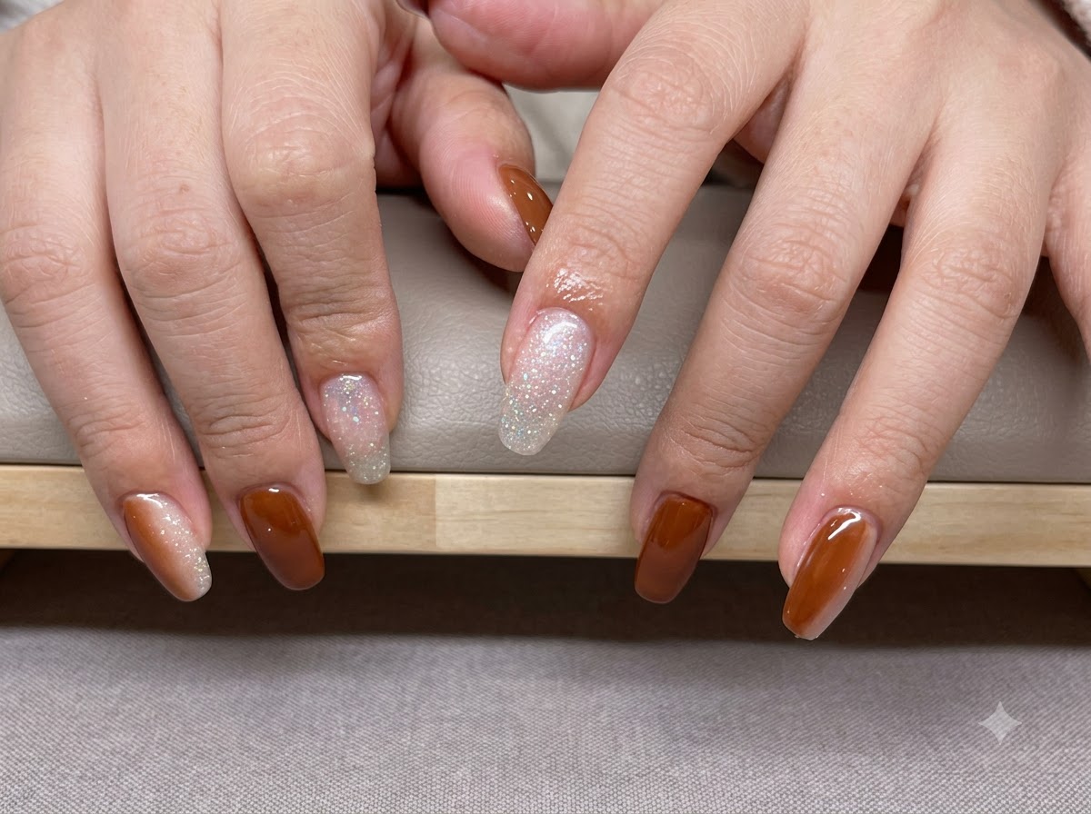Hands positioned to show the gradient blending from dark amber to warm caramel tips.