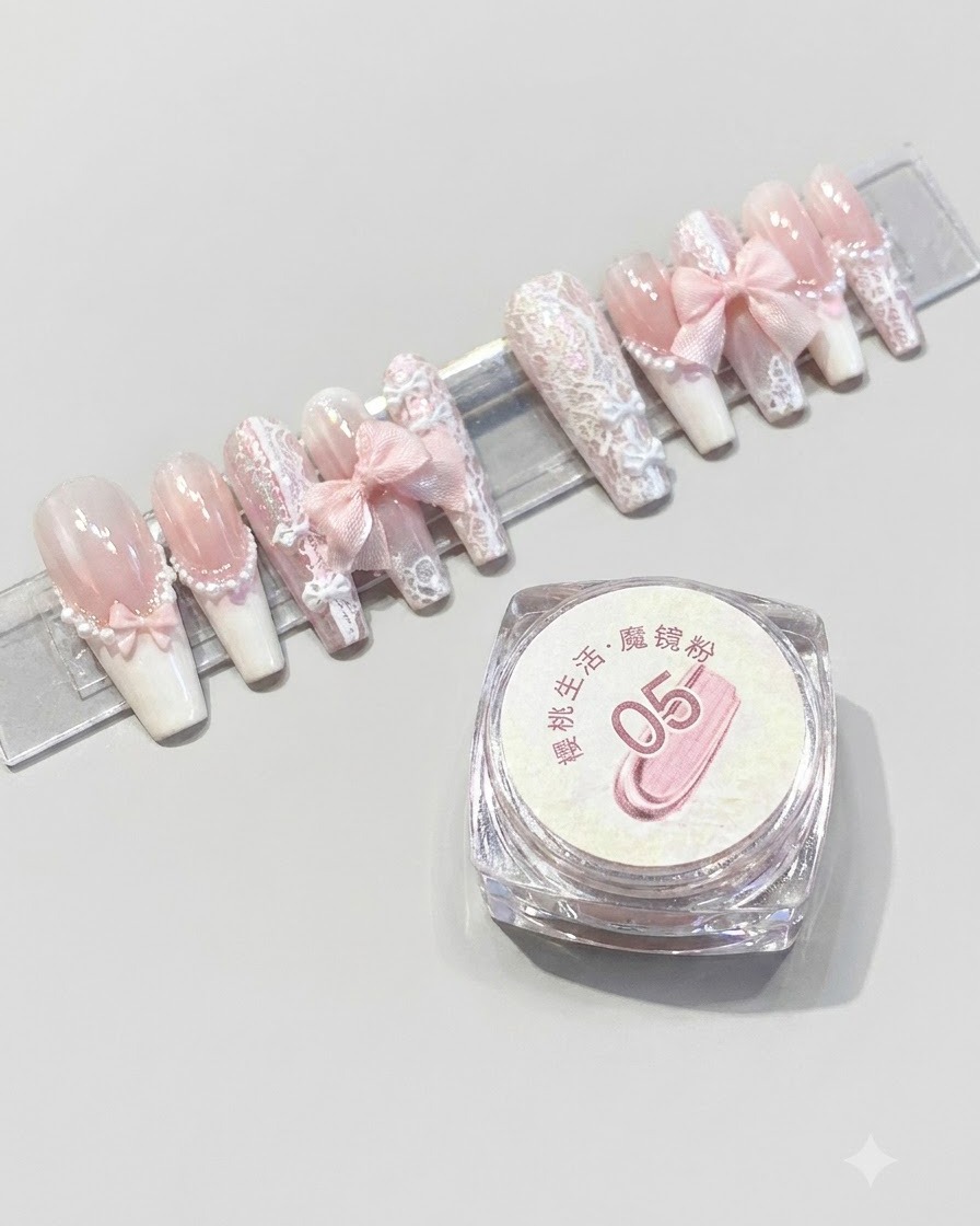 A container of Cherry Life magic mirror powder number 05 placed next to a display stand of finished pink press-on nails.