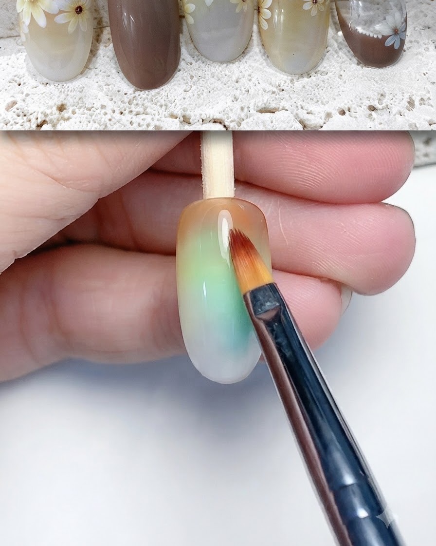 A brush applying blooming liquid or gel across the nail surface.
