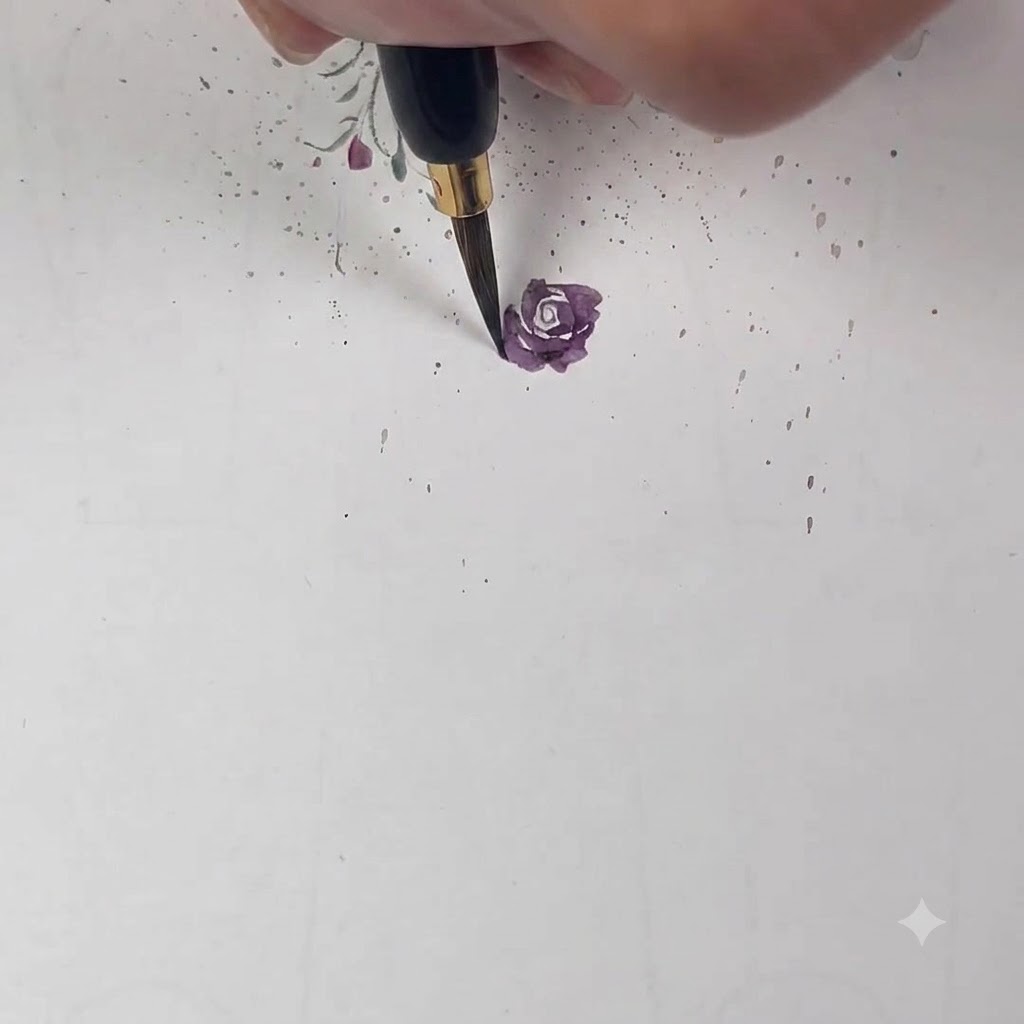 A fine brush adding a lighter purple petal that overlaps the previous layer by half.