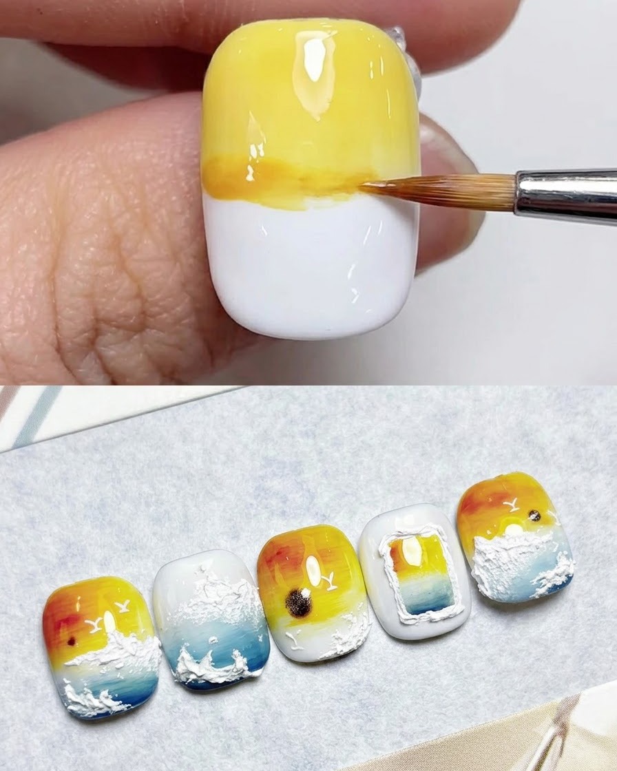 A sawtooth brush blending pale yellow gel across the upper portion of a white nail.