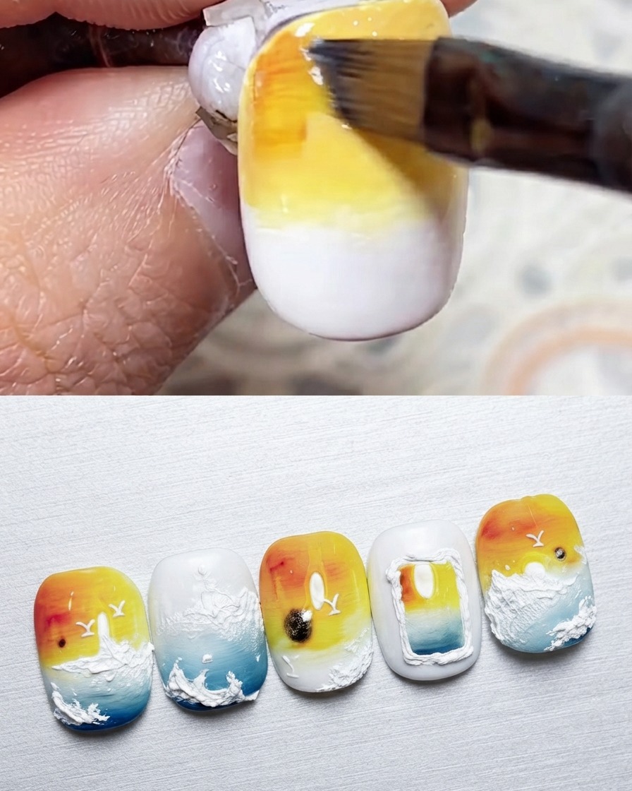 A brush applying golden orange gel to the top of the nail.