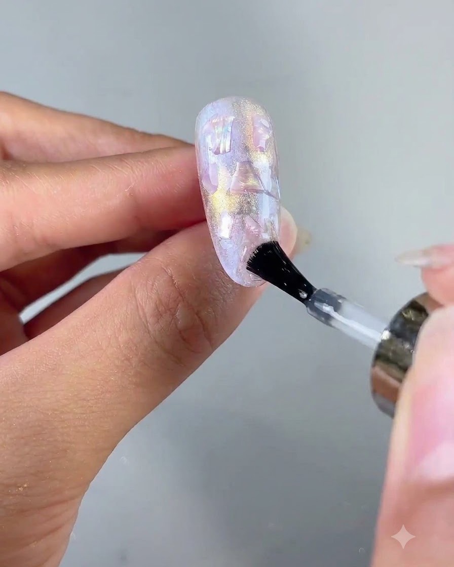Nail surface being cured under a UV or LED nail curing lamp.