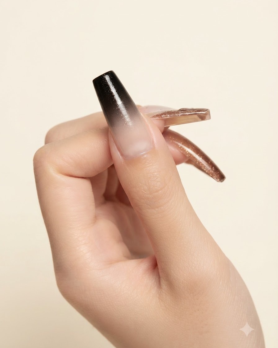 A wooden tool placing a small drop of blue cat-eye magnetic gel onto a mixing surface.