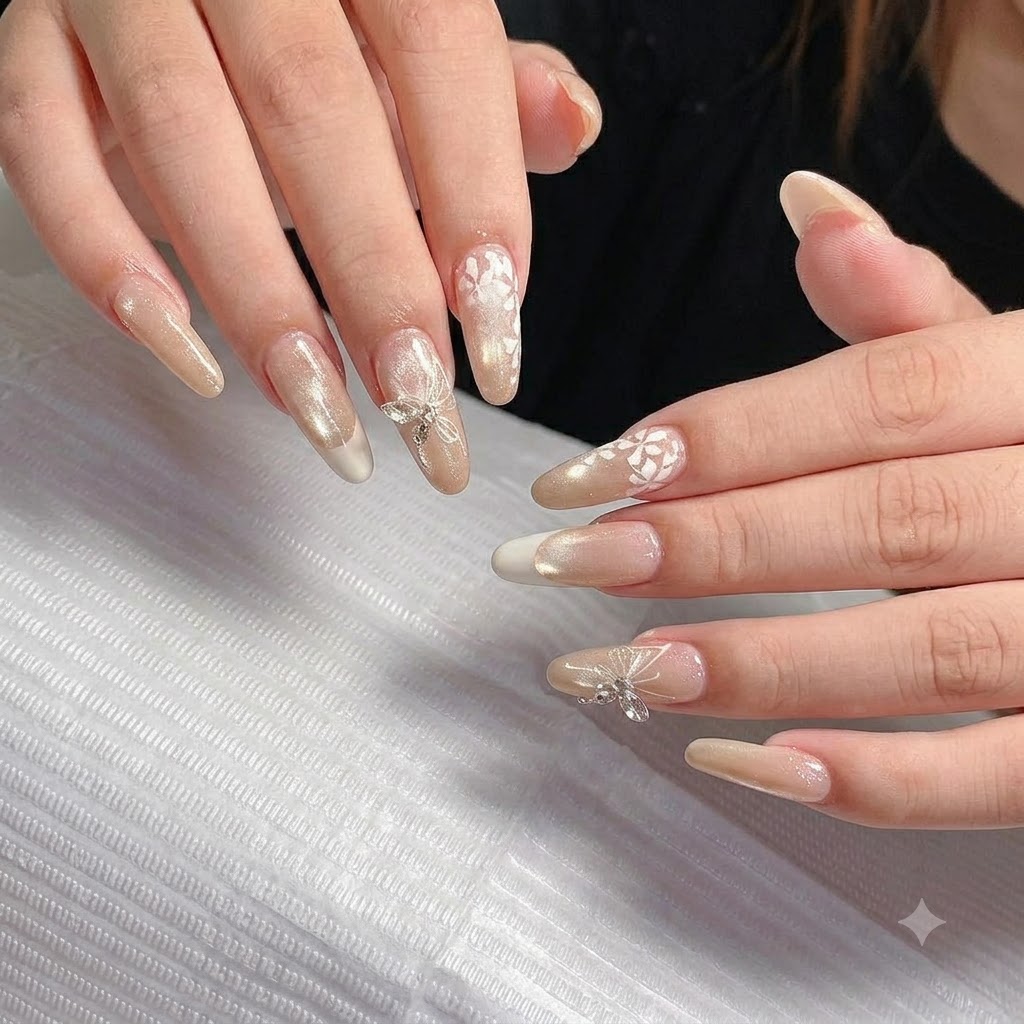 Detailed close-up of a sparkling 3D silver butterfly charm fixed securely near the cuticle of an accent nail.