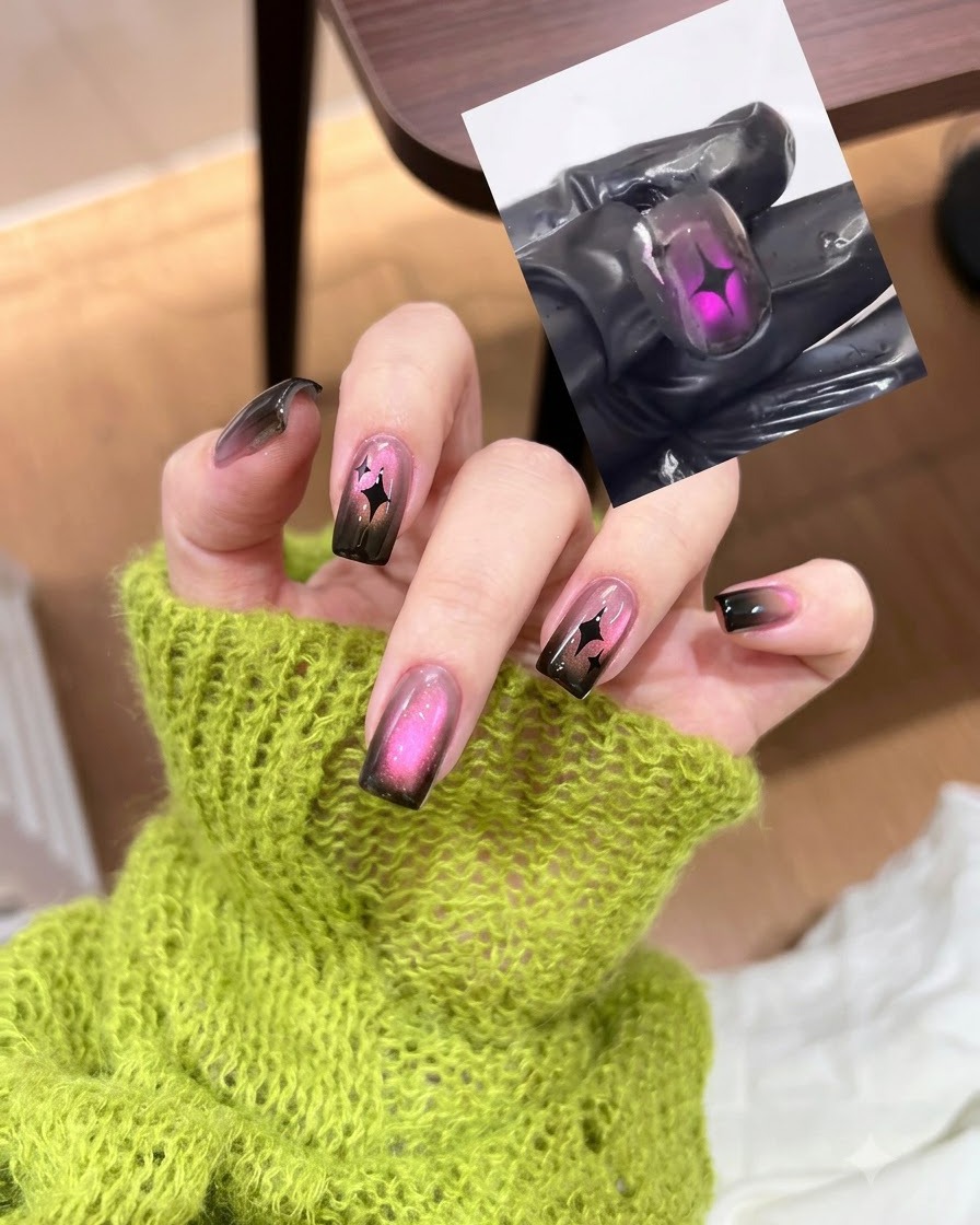 A magnet tool hovering over a pink cat eye nail to shift the magnetic particles.