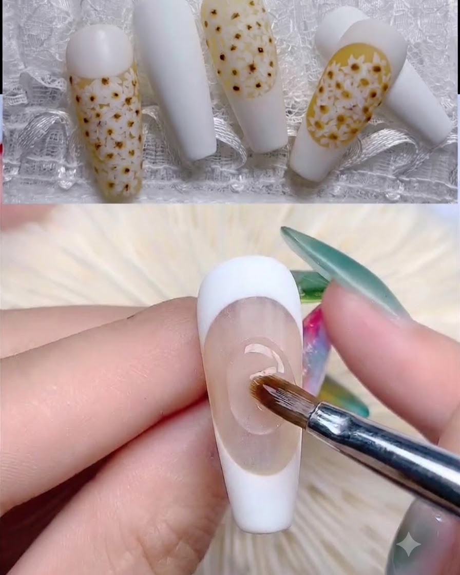 A brush applying a light yellow semi-transparent gel base onto a nail tip.