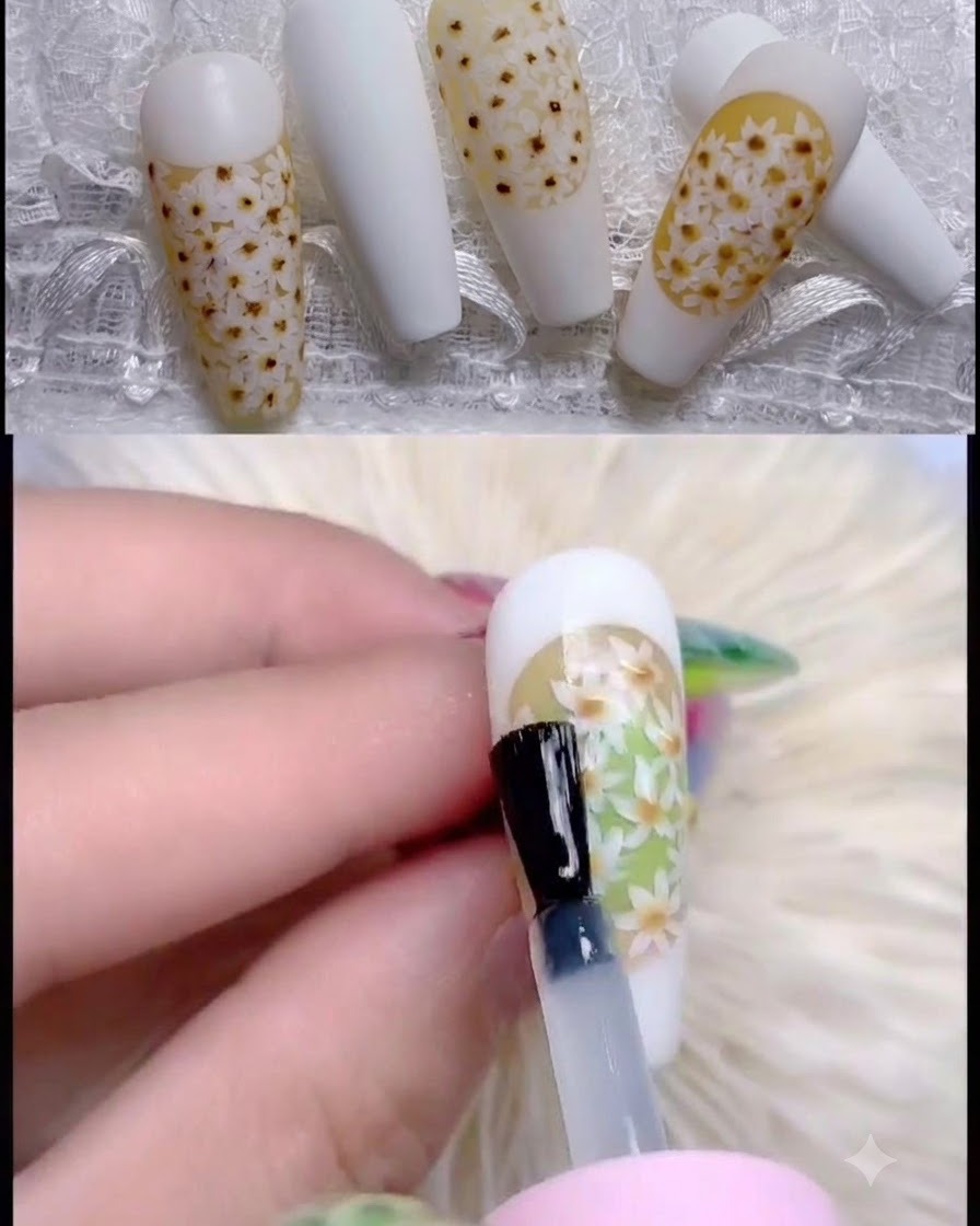 A fingernail placed underneath a professional UV lamp to cure the gel polish application.