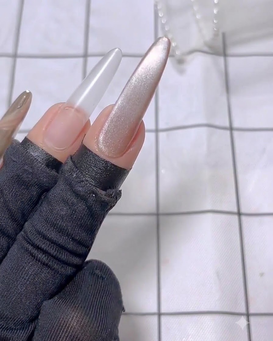 Close-up of a nail showing the concentrated cat eye light line after magnetic treatment.