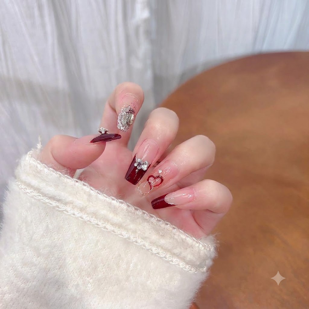 A close-up of the index finger covered in a sparkling silver glitter gel.