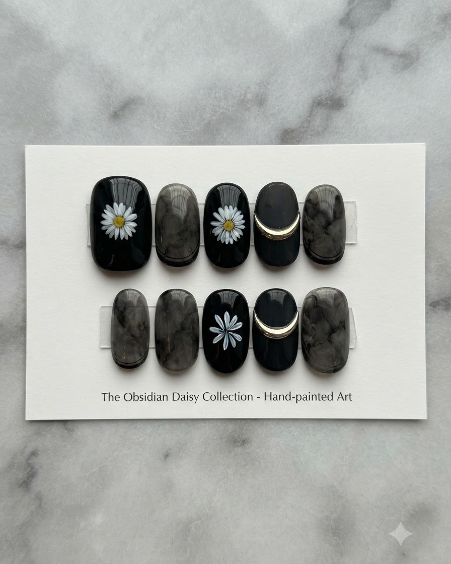 An overhead display card showing a collection of obsidian and white daisy nail art designs.