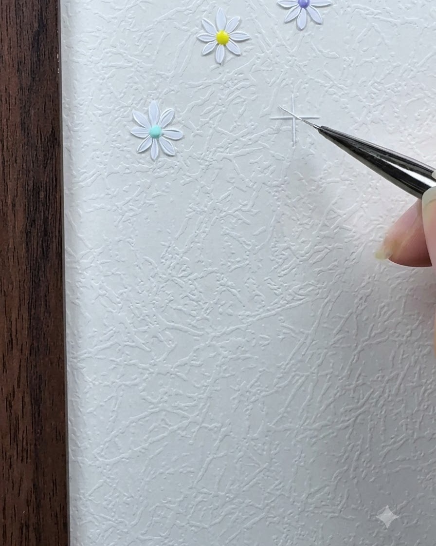 A detail brush extending the white guide lines of a star grid on a white textured surface.