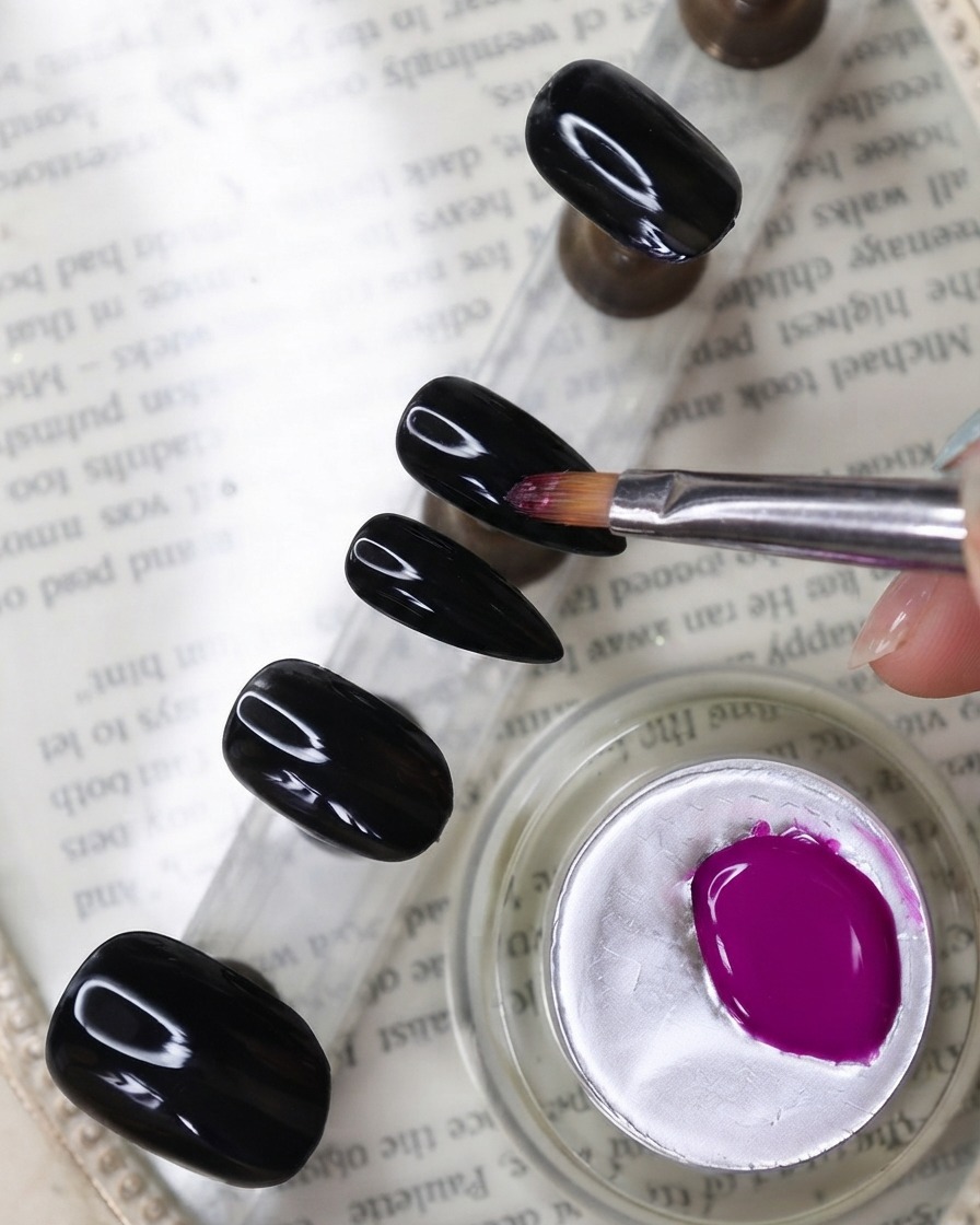 A nail brush applying a vibrant neon purple color gel to a nail mounted on a display stand next to a pot of gel.
