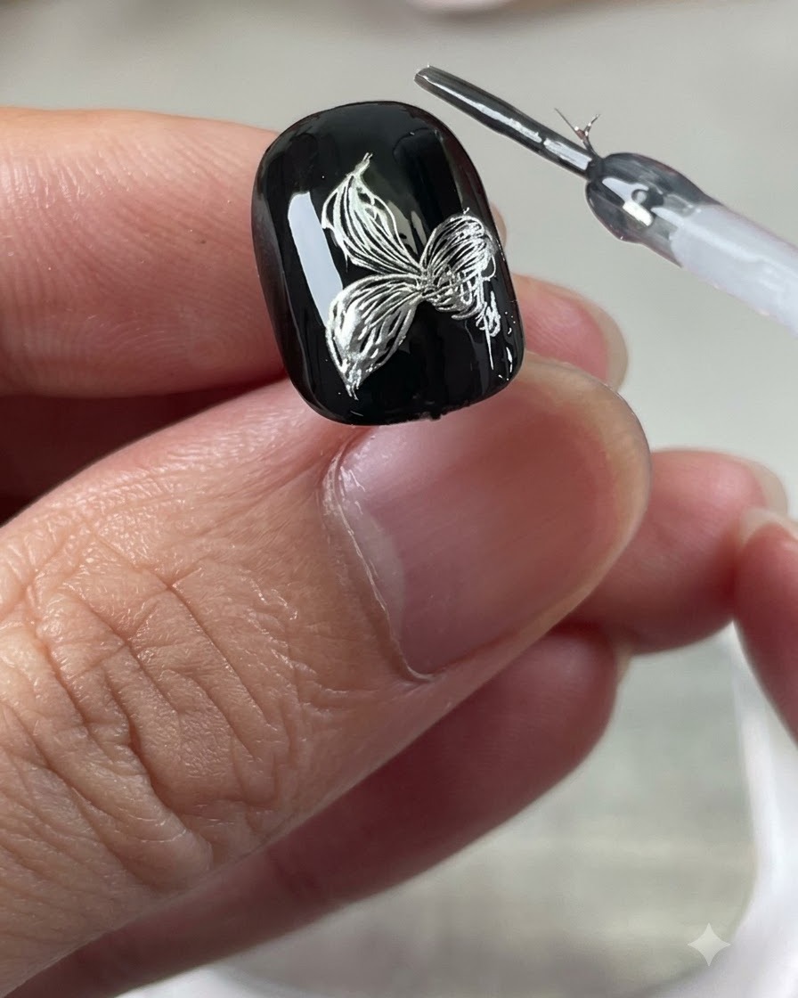 A detailed view of a silver metallic lily flower with six petals drawn on a black background.